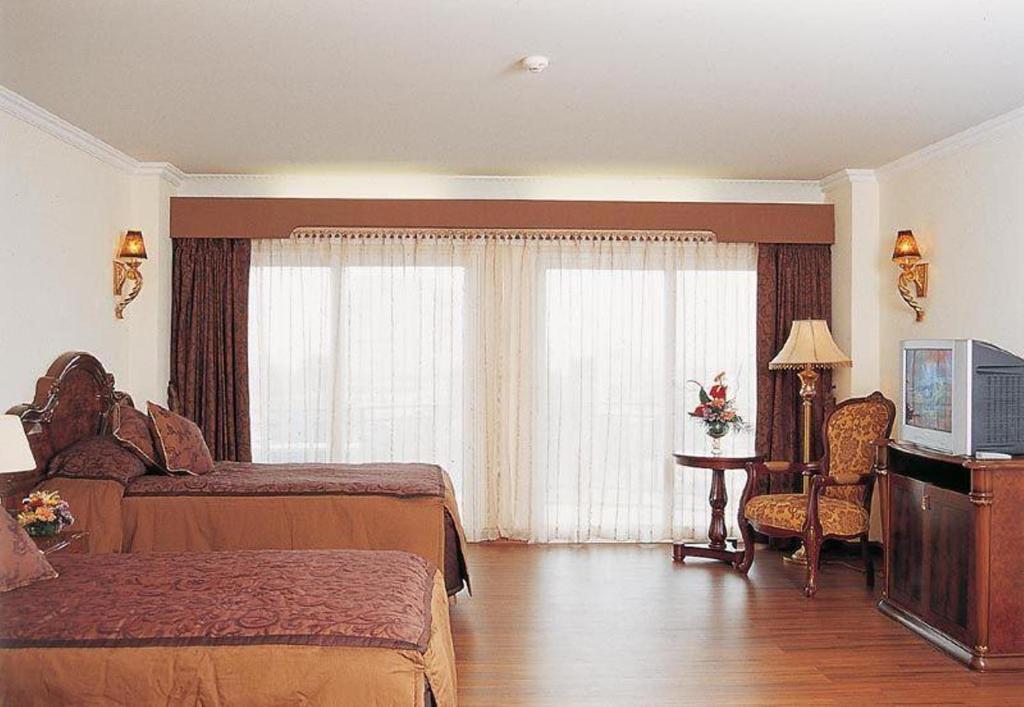 Lk Metropole Hotel Pattaya Room photo